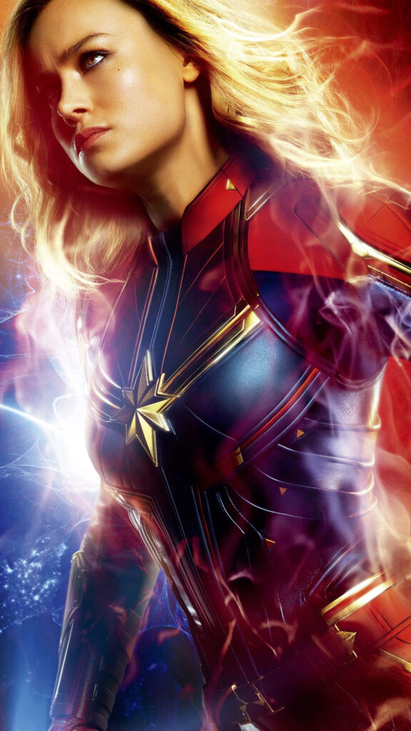 Captain Marvel Brie Larson in red blue gold suit glowing cosmic energy vibrant superhero wallpaper