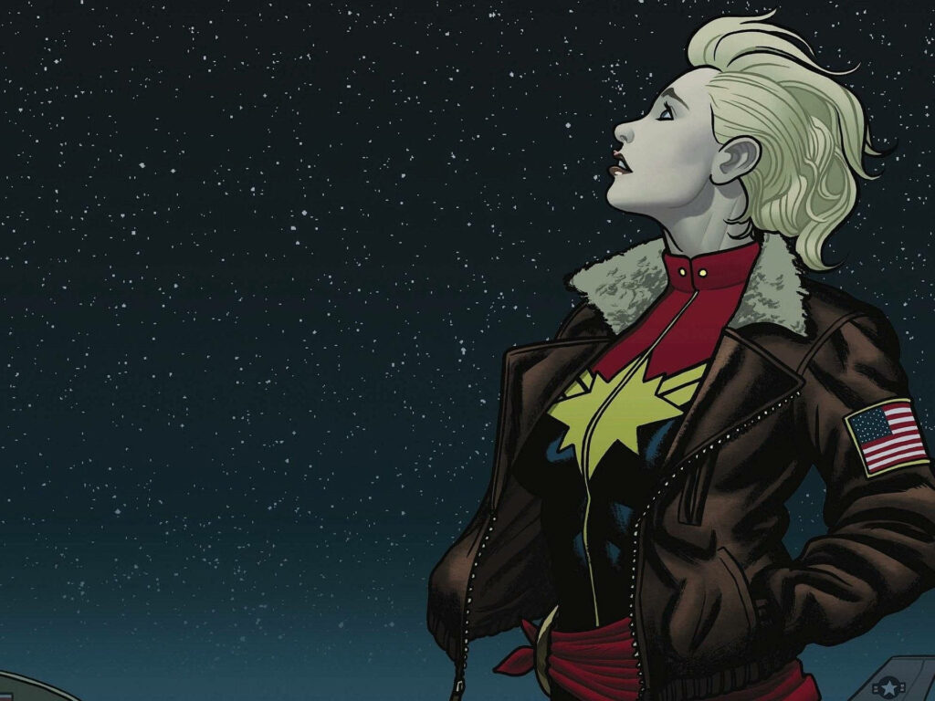 The Empowered Marvel Heroine: Captain Marvel, Embracing Strength and Ready for Her Next Adventure Wallpaper