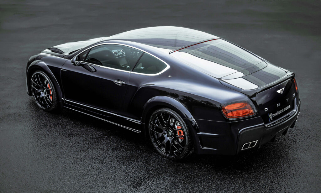 Bentley Continental GT V8 Coupe showcasing elegance in Onyx Black Wallpaper