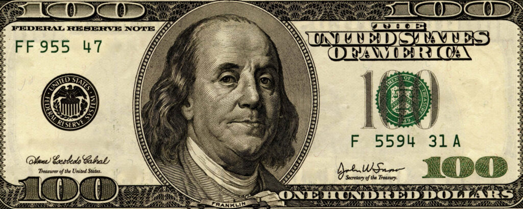 Infinite Wealth: A Captivating 100-Dollar Bill Desktop Delight Wallpaper
