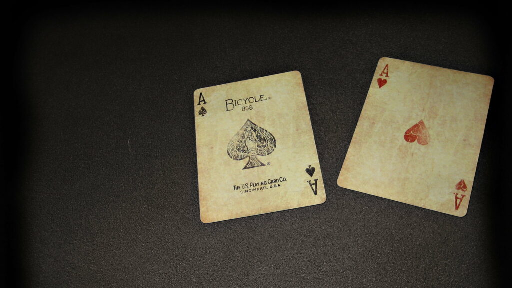 Playing with the Aces: Stunning 4K Wallpaper featuring a Deck of Cards