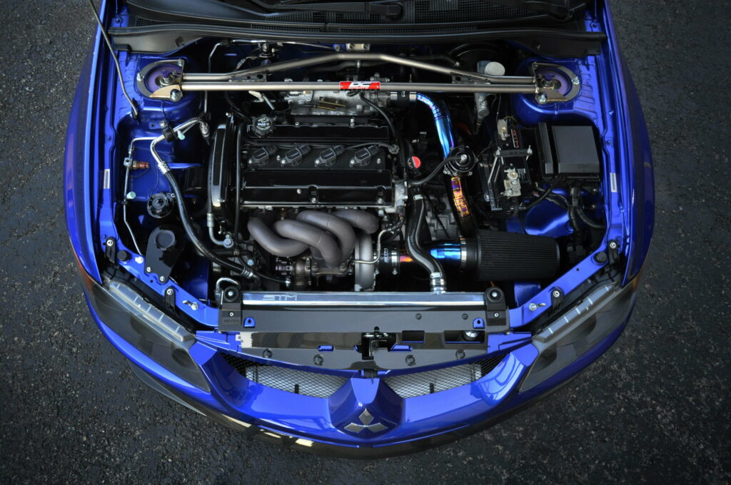Unleashing Horsepower: Stunning 4K Car Wallpaper Showcasing STM Car Gallery's Striking Engine Bay
