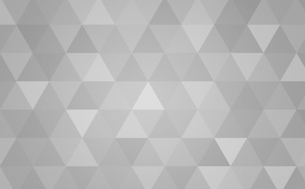Minimalist abstract wallpaper with seamless geometric grey triangles and subtle lighting gradients