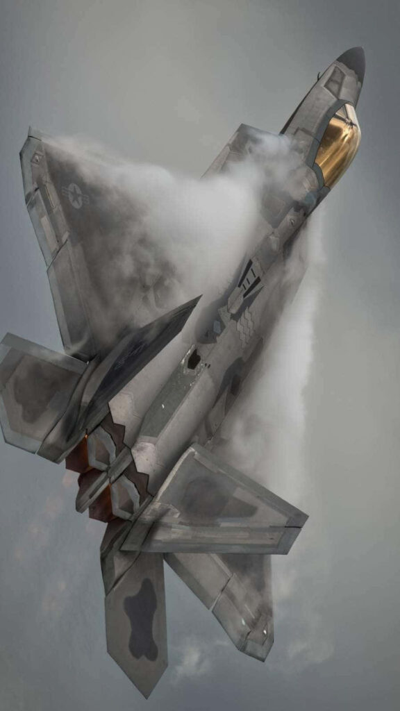 Miraculous Encounter: Majestic F-22 Raptor Soaring Through Enigmatic Skies Wallpaper