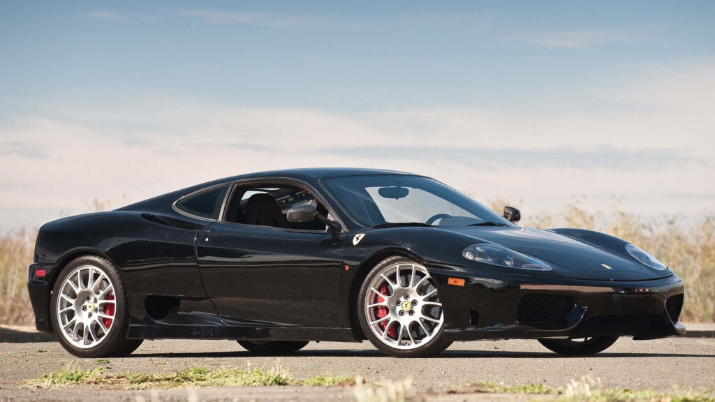The Alluring Beauty of a Majestic Black Ferrari 360 Modena: Empowering Dreams for Auto Aficionados and Ferrari Devotees Wallpaper
