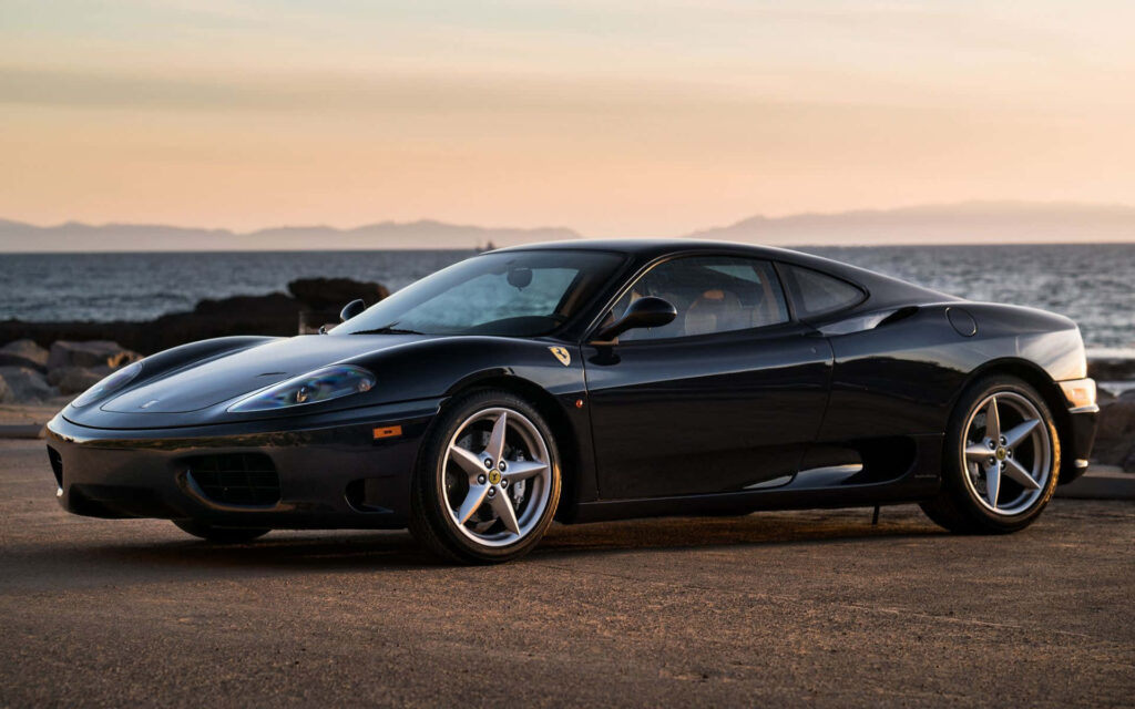 Captivating Display of Ferrari 360 Modena: An Iconic Sports Car Amidst Enchanting Splendor Wallpaper