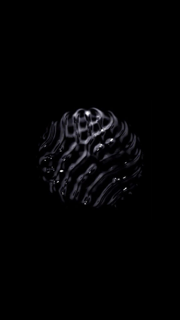 Captivating Perspective: Striking Wallpaper Displaying a Unique Overhead Snapshot of a Black 3D Microphone
