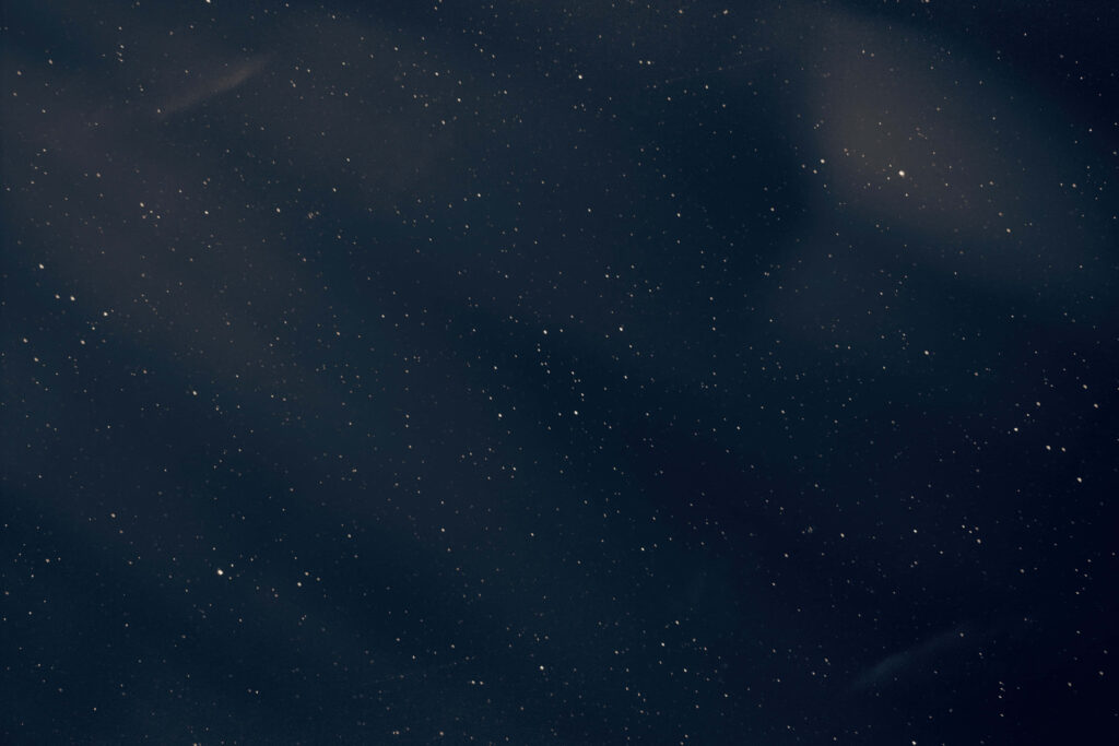 Serene Black Gradient Wallpaper: Starry Night & Ethereal Clouds