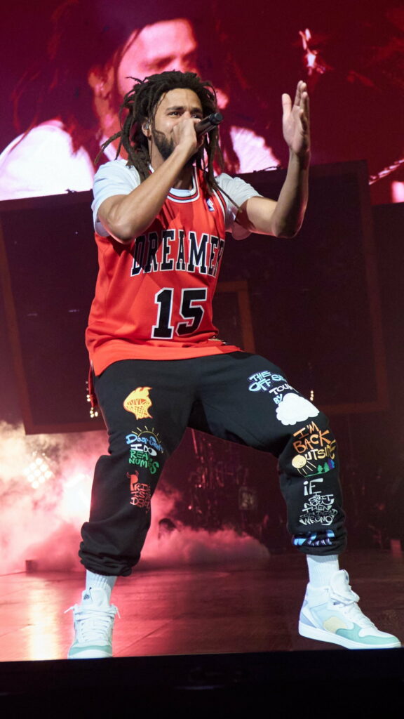 Catching J Cole's Electric Hip Hop Waves Live: Unforgettable Concert Experience Captured in HD Phone Wallpaper