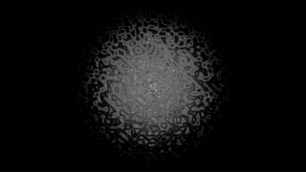 Mesmerizing Circular Pattern Wallpaper on Black Background