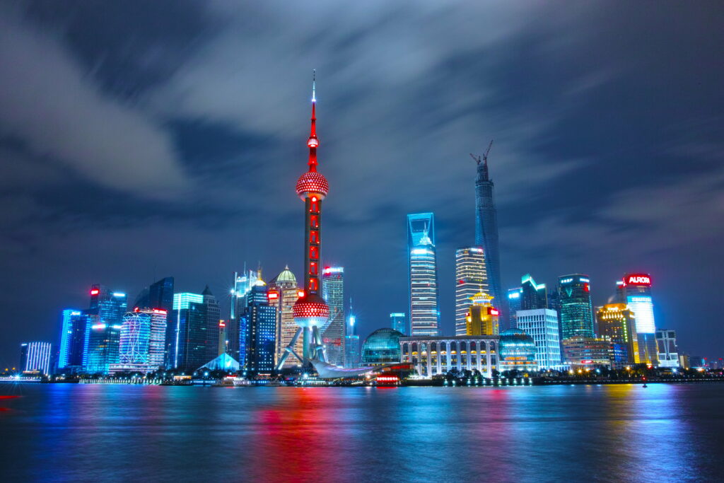 Discover the Majestic Cityscape of Shanghai's World Financial Center: A 4K Wallpaper Background Photo