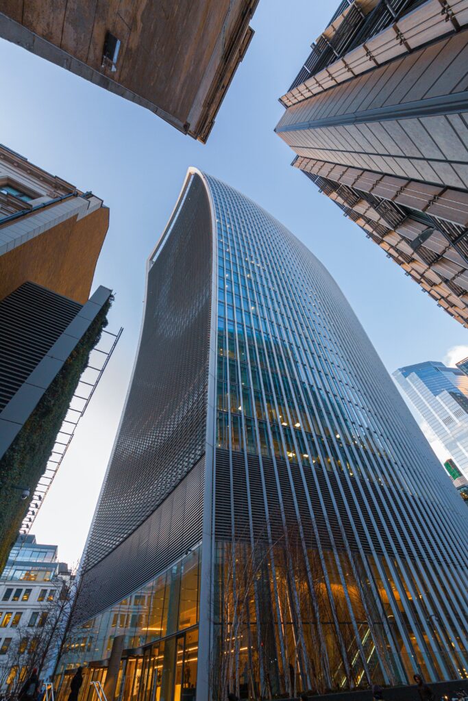 Stunning Cityscape Wallpaper: Dramatic Bottom-Up View of Modern Architecture