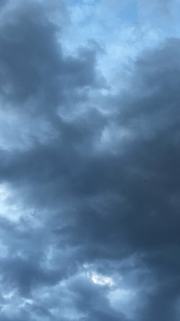 Cloudy Sky HD Phone Wallpaper: Dramatic Grey & Blue Background