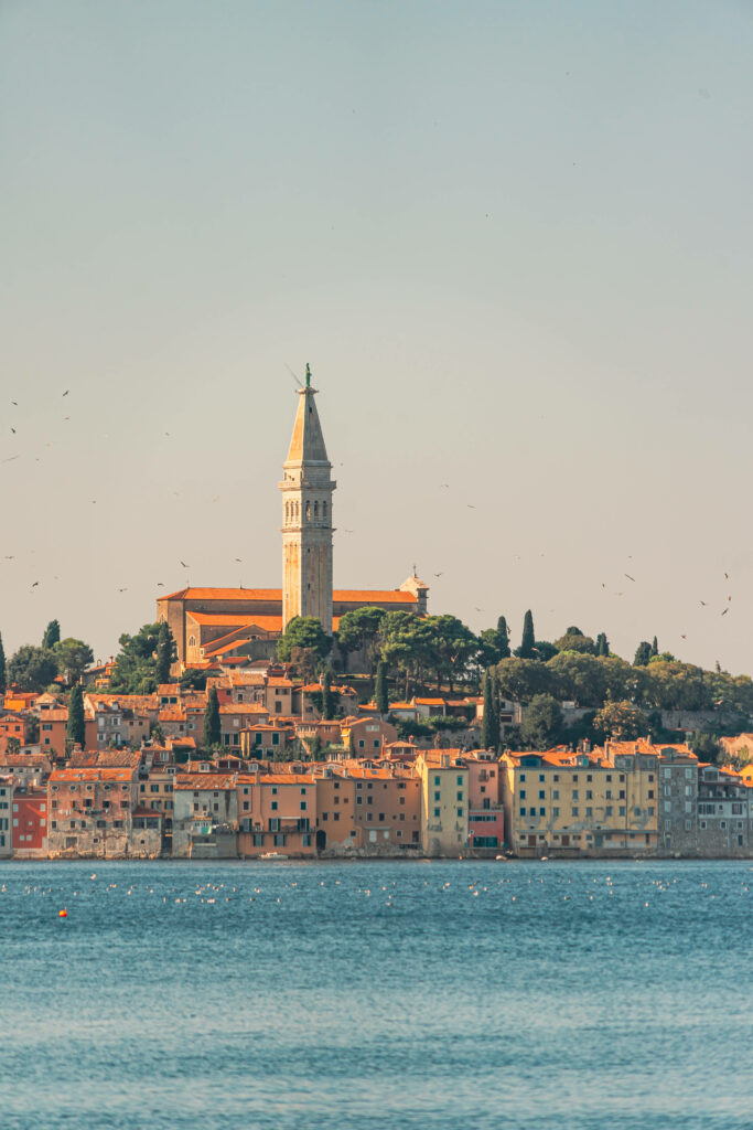 Captivating Coastal Beauty: Rovinj's Crystal Waters and Magnificent Cityscape in Stunning HD Wallpaper