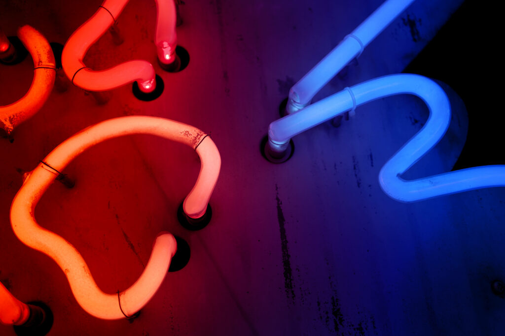 Vibrant Neon Illuminates Rustic Wooden Backdrop in Captivating Visual Wallpaper