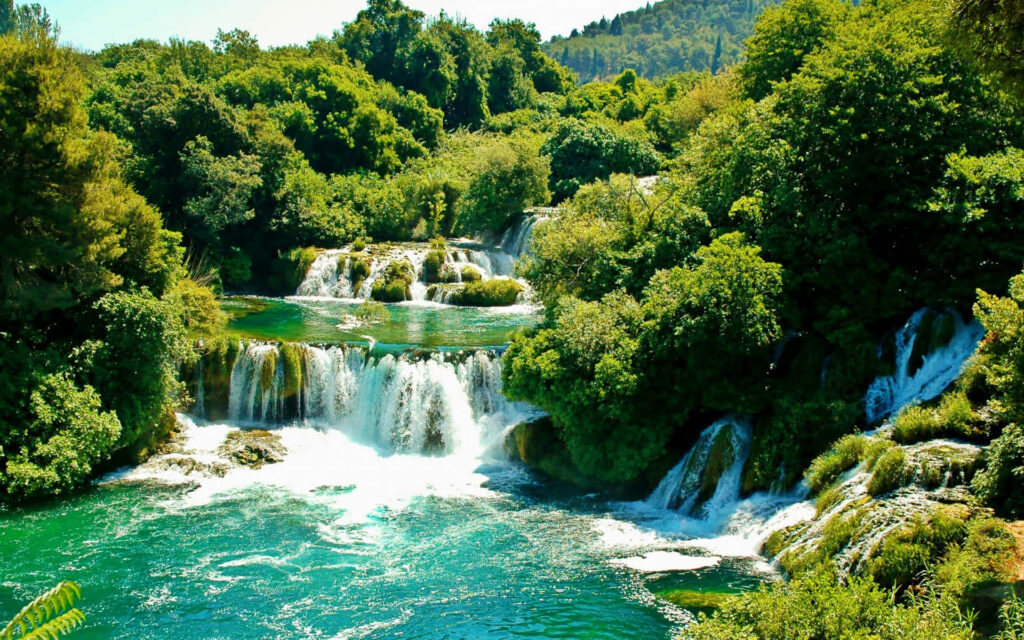 Captivating Cascades: Croatia's Breathtaking Waterfall Wallpaper