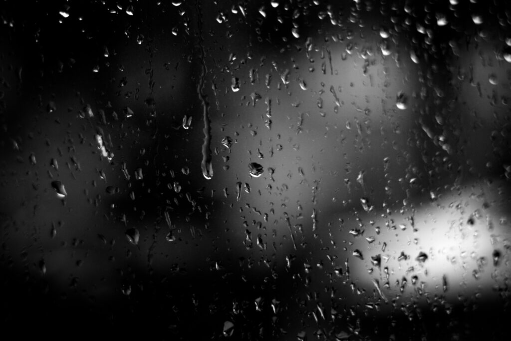Moody Dark Wallpaper: Macro Raindrops on Glass for Tranquil Vibes