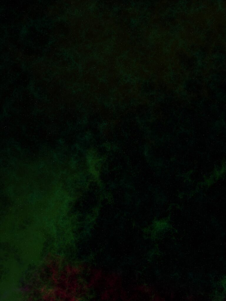 Serene Cosmic Wallpaper: Dark Nebula with Green & Red Hues