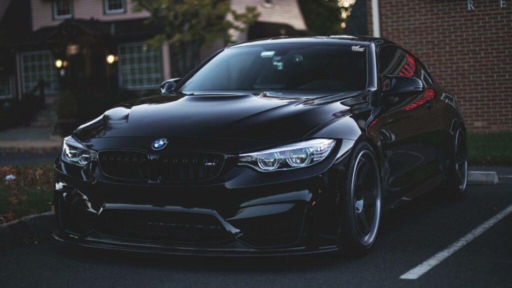 Sleek and Stunning: Daytime Elegance with the BMW M4 GTS Laptop Wallpaper