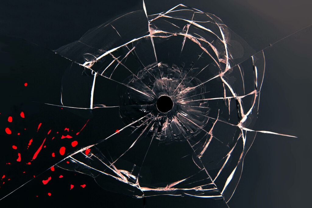 Shattered Beauty: Red Web Design on Black Broken Glass Screen with Hole Wallpaper