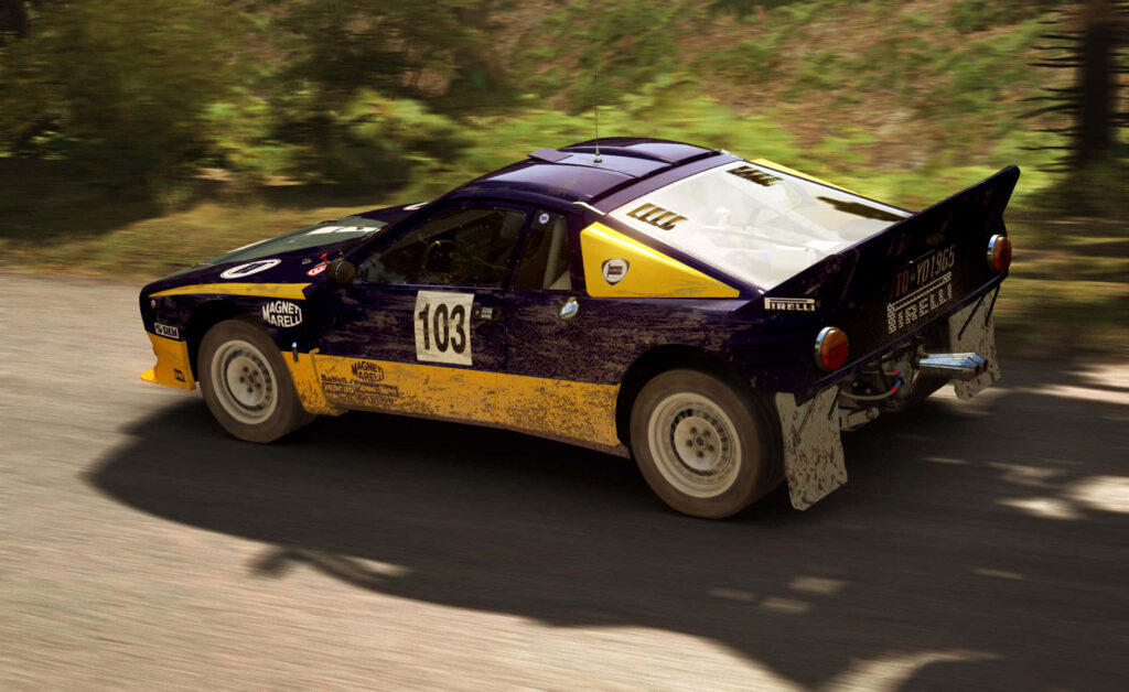 A Stunning and Exciting Dirt Rally Scene Featuring a Striking Dark Purple and Yellow Volkswagen Scirocco as the Focal Point Wallpaper