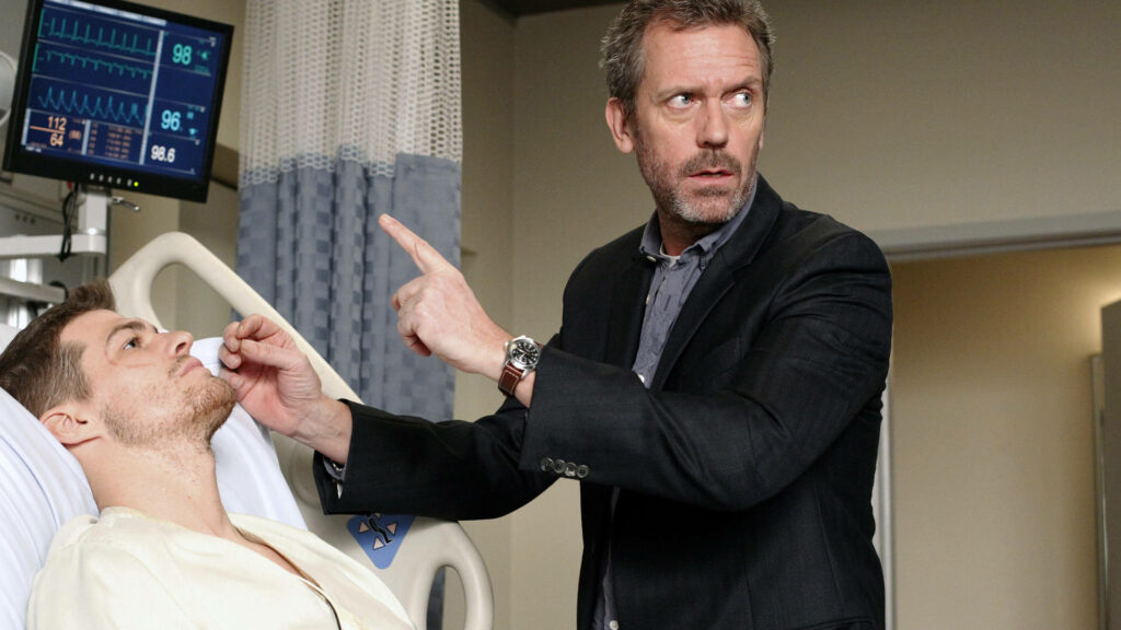 Stunning House MD Wallpaper: Dr. Gregory House Analyzing a Patient