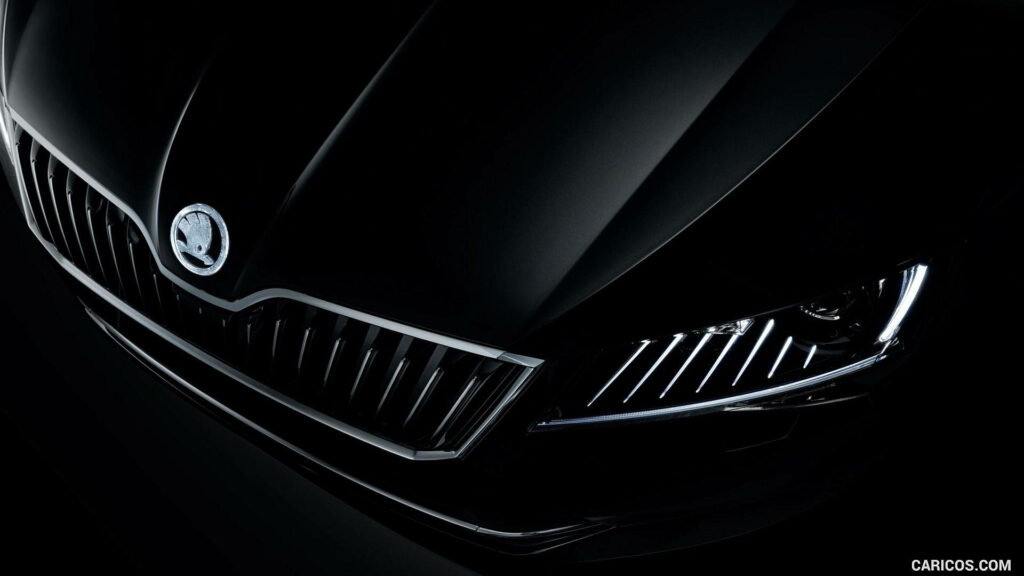 Dazzling Skoda Superb Black Crystal: A Close-Up View of Exquisite Detail - HD Wallpaper for an Impressive Skoda Background Photo