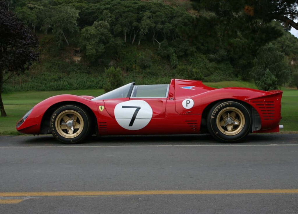 Sleek and Striking: Showcasing the Iconic Ferrari 330 P4's Timeless Elegance in Fiery Red Wallpaper