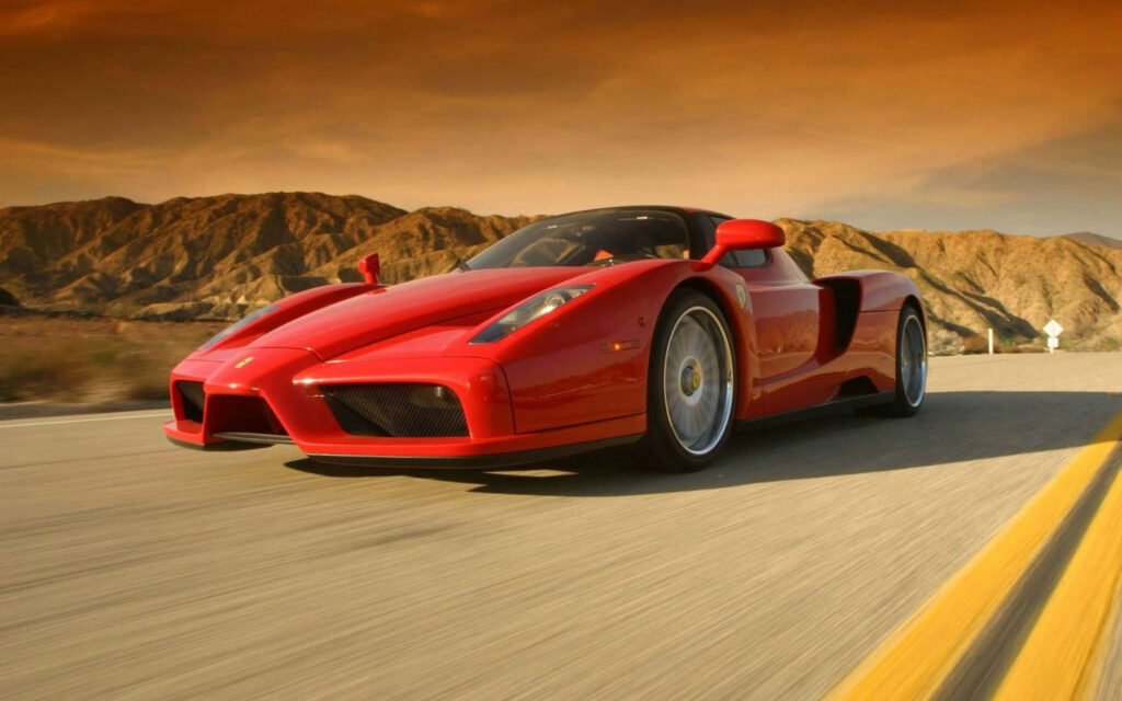 Ferrari Enzo: A Majestic Masterpiece Embracing Nature's Beauty Wallpaper