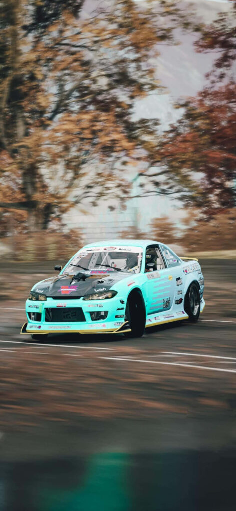 Forza Motorsport 7 Scene with a Light Blue Audi Wallpaper