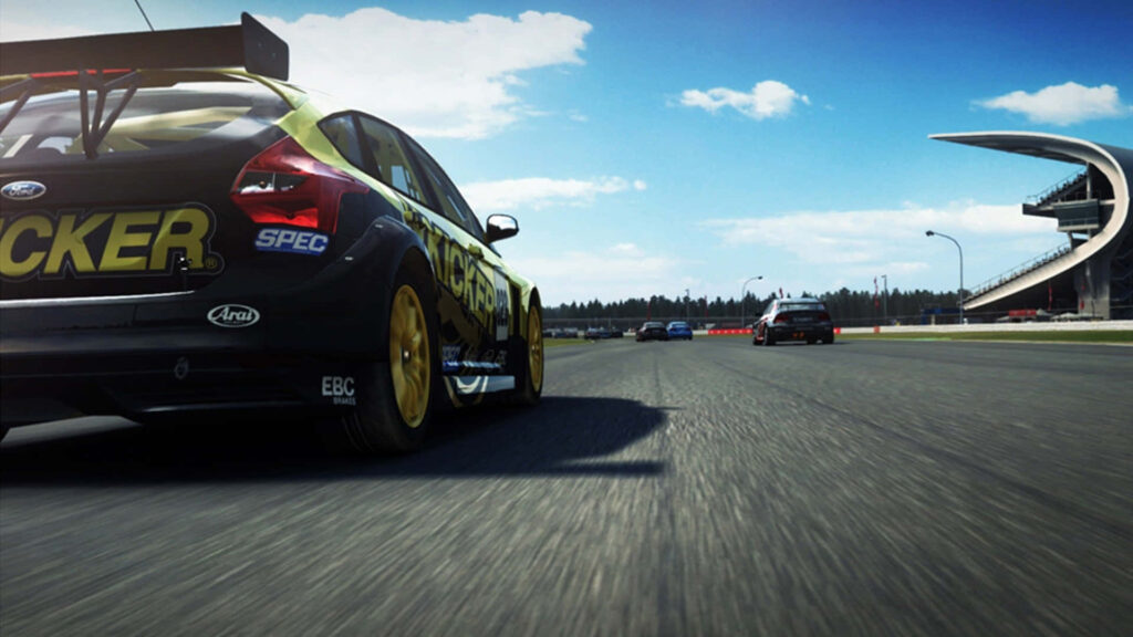 Grid Autosport: Dynamic Racing Car in High-Speed Chase on Sunlit Track Wallpaper