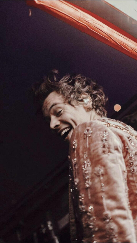 Charming Harry Styles Aesthetic Wallpaper with Soft Lighting