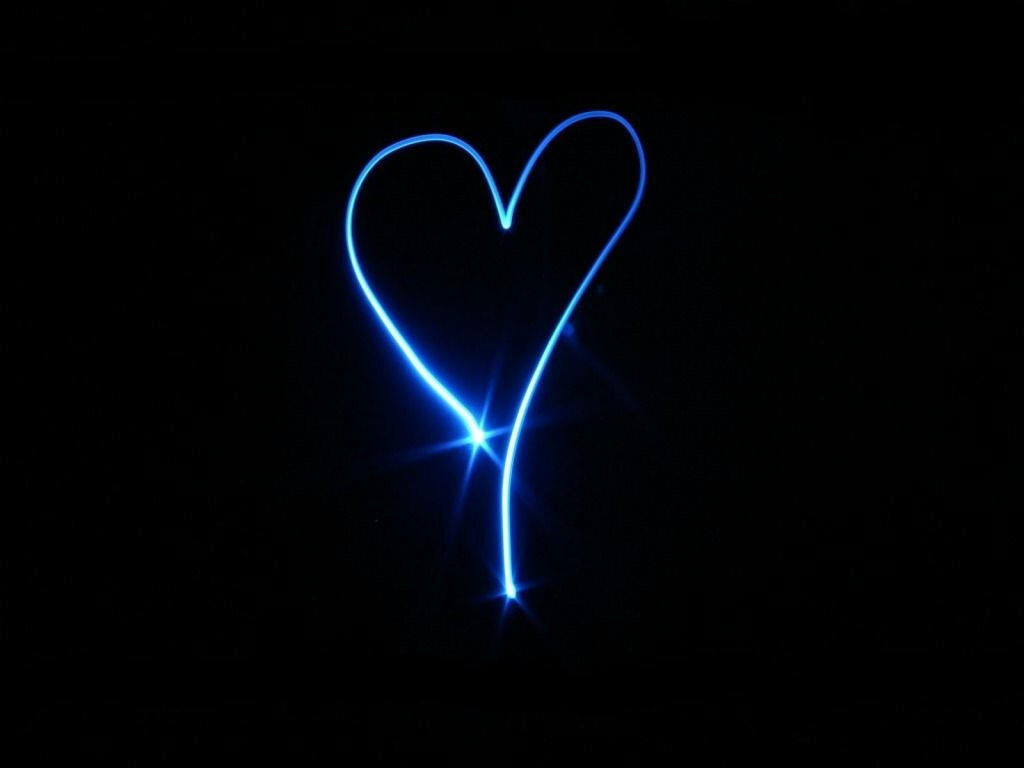 Blue Heart Glow: Mesmerizing Neon Light Wallpaper