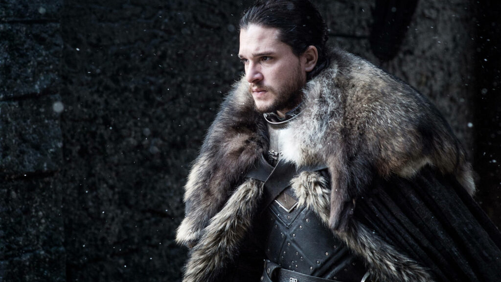 Jon Snow Wallpaper: Captivating Fur-Trimmed Coat in Snowy Setting