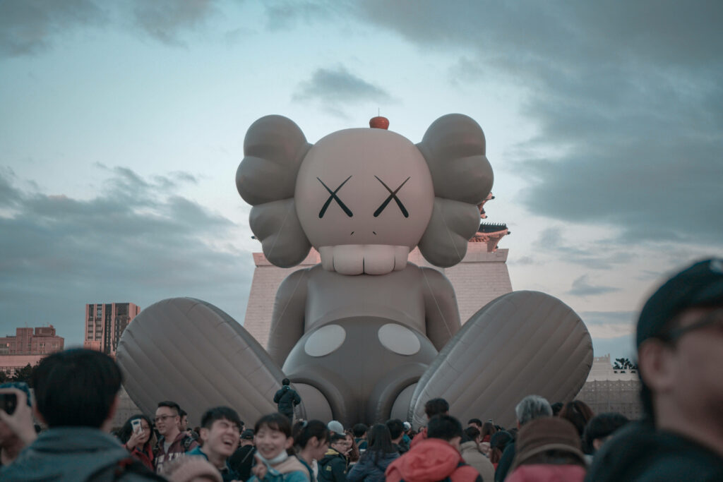 Kaws Companion: A Larger-than-life Inflatable Artwork Takes Over the Scene Wallpaper