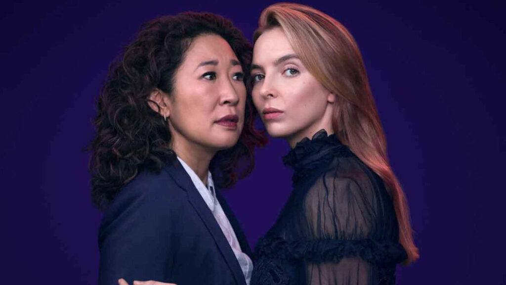 Intense Killing Eve Duo Portrait Wallpaper - Dark Backdrop Design