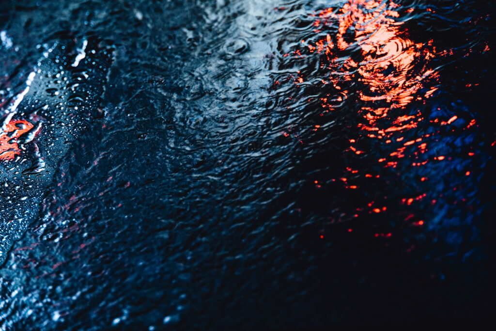 Fluid Symphony: Captivating Macro Raindrops in a 5K Wallpaper Masterpiece
