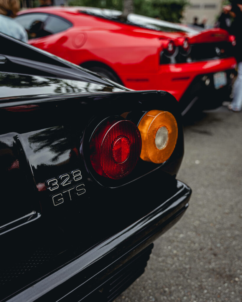Exquisite Macro Capture: Mesmerizing Rear-Lit 4k Ferrari 328 GTS Black Car Model Shining Against Enchanting Background Wallpaper