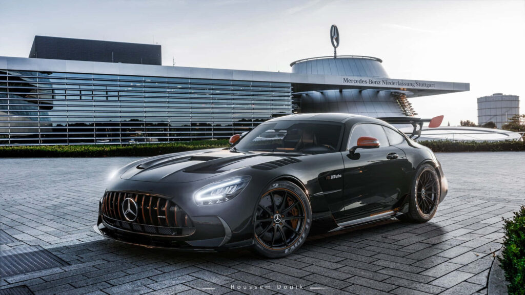 Urban Elegance: Captivating Mercedes GTS Poses on Towering Architecture Wallpaper
