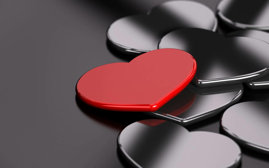 Shimmering Love: A Captivating Background of Metallic Red and Silver Heart Coasters Wallpaper