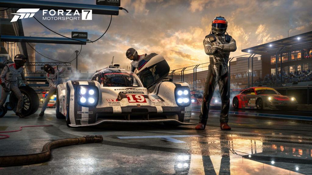 Skilled Racer Strikes a Pose with a Pit Crew, Repairing a Porsche 911 GT2 RS in Forza Motorsport 7 Wallpaper