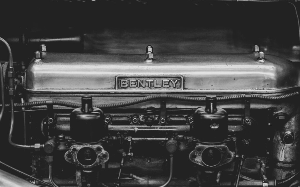 Vintage Beauty: Monochrome Snapshot of an Antique Bentley Engine Bay Wallpaper