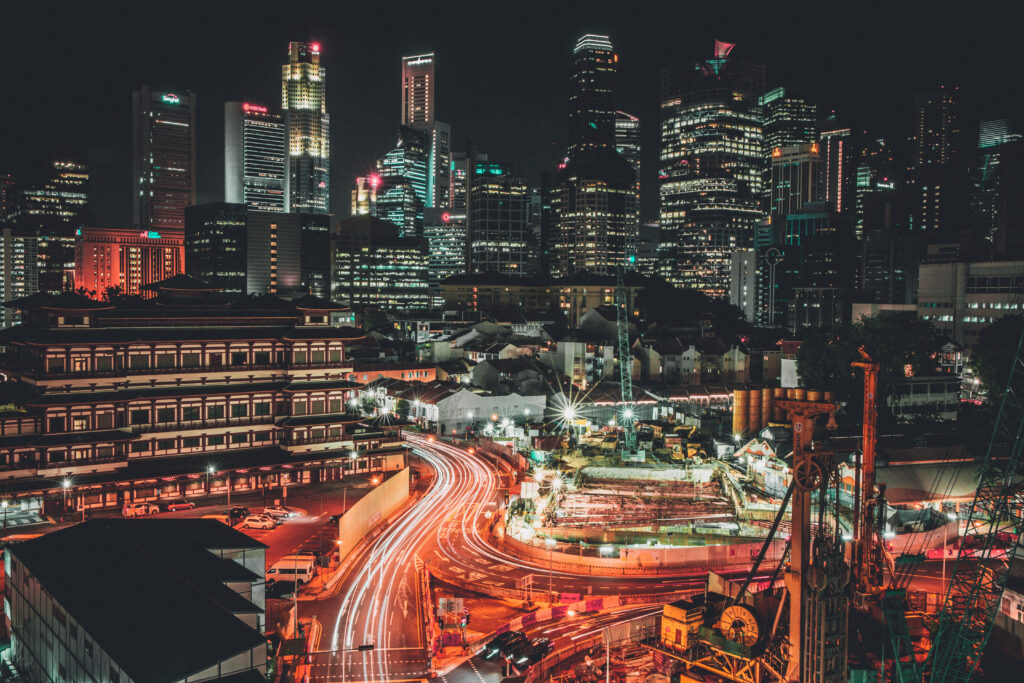 Captivating Night Cityscape Wallpaper: Glowing Buildings & Freezelight