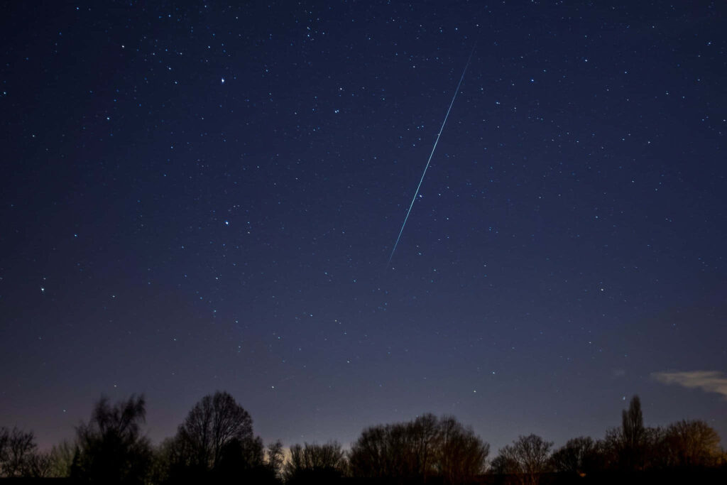 Stunning Night Sky: Meteor Over Serenity - Wallpaper Background