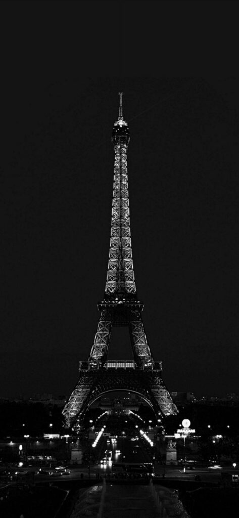 Twilight Splendor: Mesmerizing Eiffel Tower Captured in iPhone Dark Wallpaper