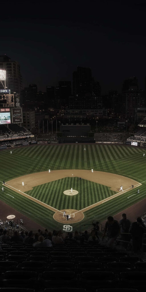 Stunning Nighttime Baseball Game - Urban Stadium Wallpaper Background