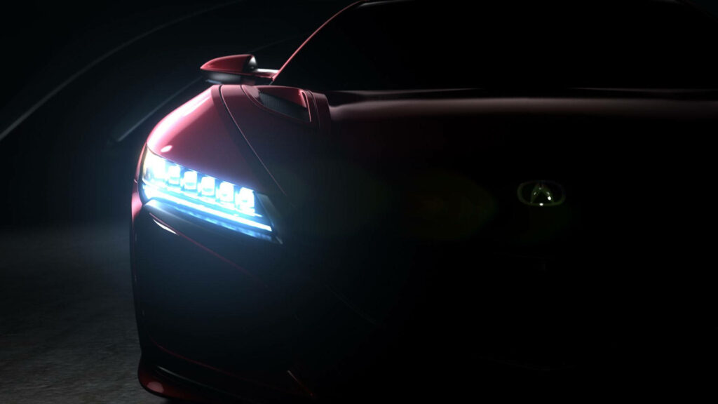 Captivating Nighttime Encounter: Illuminated Acura Shines Through the Darkness Wallpaper