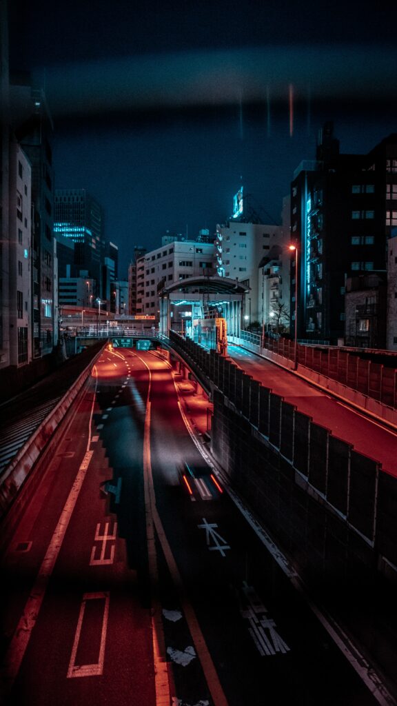 Vibrant Nighttime Cityscape Wallpaper: Illuminated Aerial View