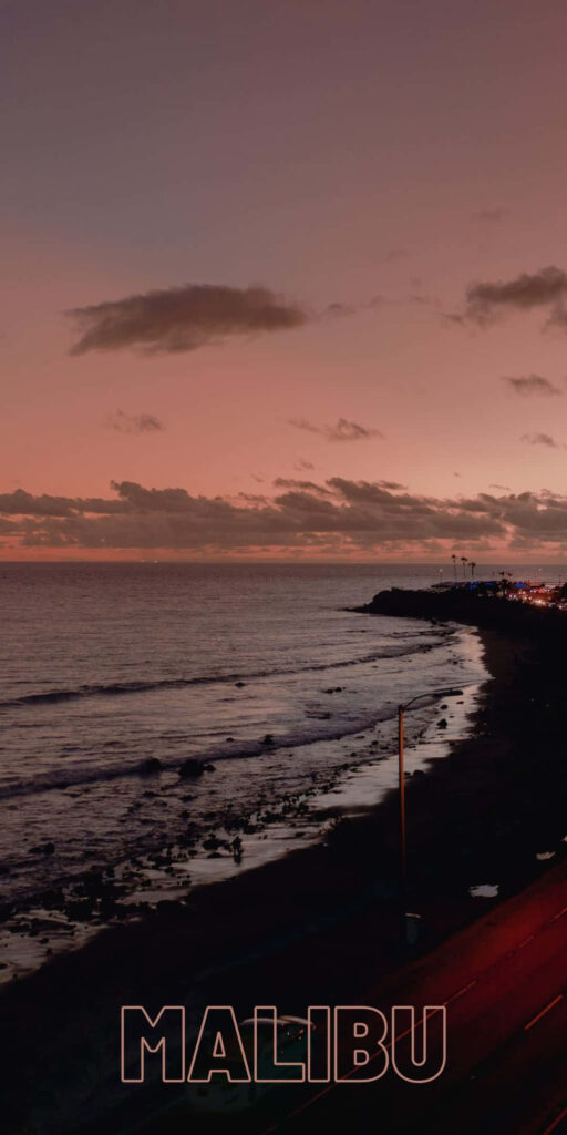 Nightscapes: Capturing the Serene and Mysterious Malibu Beach Shore Wallpaper