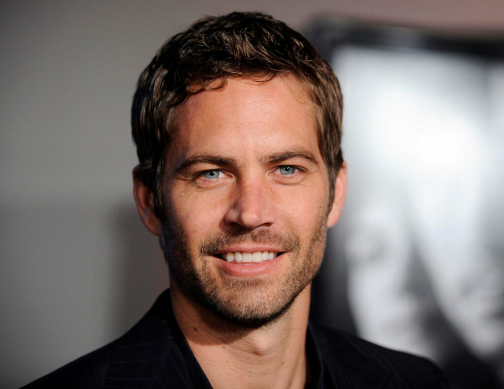 Paul Walker: Captivating Man, Versatile Actor – Striking QHD Wallpaper Portrait